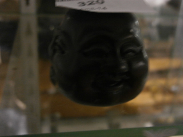 Hand carved 4 faced Buddha netsuke