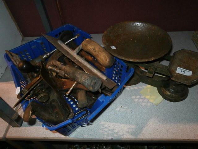 Set of metal scales and a basket of tools