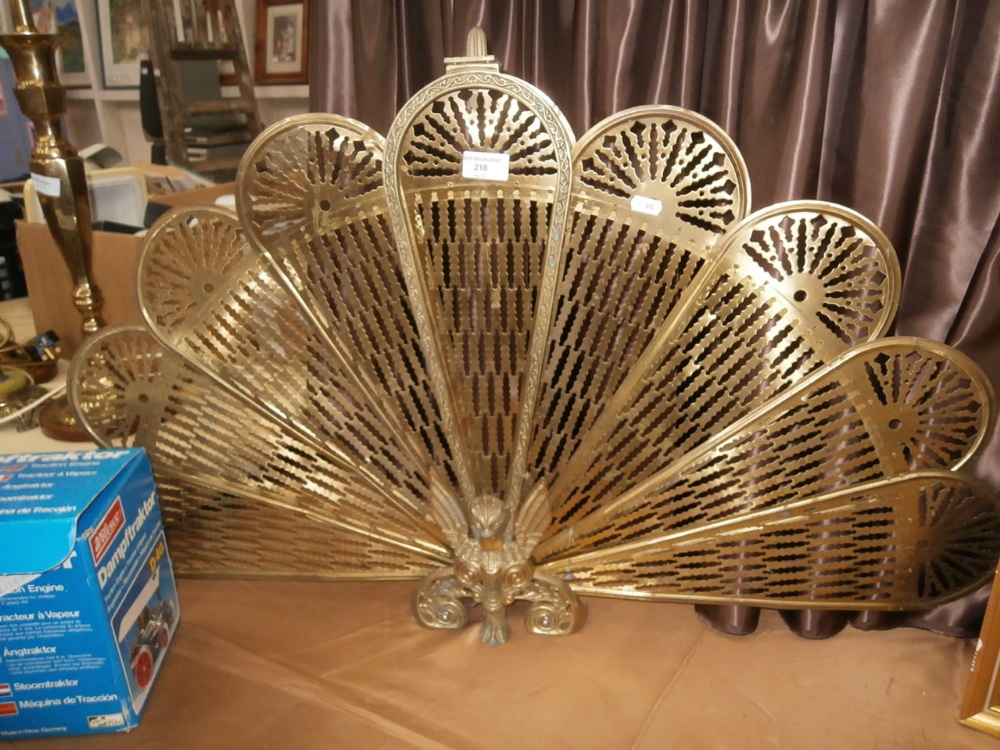 Brass peacock fire guard