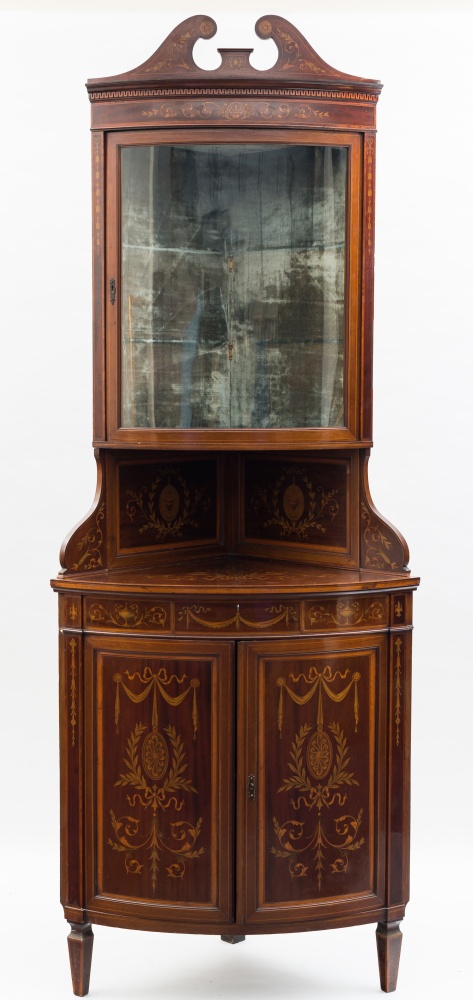 By Edwards & Roberts - An Edwardian mahogany and marquetry bow-fronted standing corner display