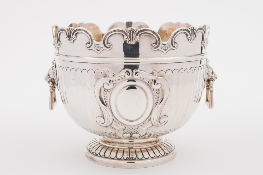 A Victorian silver punch bowl, maker William Hutton and Sons, London 1899: with scrolling wavy