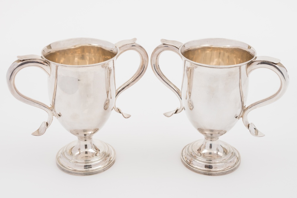 A pair of Victorian silver loving cups, maker Haksworth Eyre & Co Ltd, Sheffield, 1855: of plain