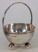 An Elizabeth II hammered silver cream pail, maker Guild of Handicraft, London, 1996: of circular