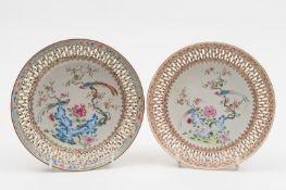 A matched pair of Chinese famille rose reticulated dishes: each painted with two long-tailed birds,