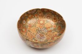 A Satsuma earthenware bowl: of circular and mildly cinquefoil form, the interior and exterior