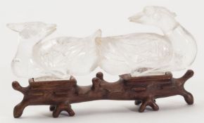 A Chinese carved rock crystal study of two birds: modeled tail to tail, 13cm long [damaged] and