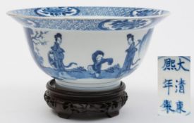 A Chinese blue and white bowl: with flared rim and short cylindrical foot rim, the exterior painted