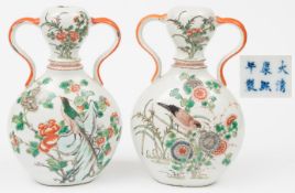 A pair of Chinese famille verte moonflasks: of two-handled double gourd form, each painted with a