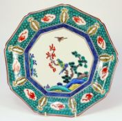 A Japanese Ko-Kutani style octagonal dish: in the 17th century manner, painted in bright green,