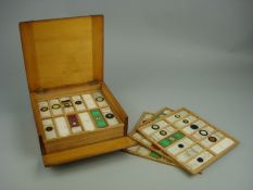 An cased set of early 20th century microscope slides:, both Botanical and Biological in subject ,