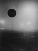 Brassai (1899-1984) - Denfert Rochereau in The Fog, Paris, 1934 Gelatin silver ferrotyped print,