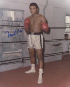 SP A colour 10 x 8" full length photograph of Muhammad Ali, signed in blue ink SP A colour 10 x 8"
