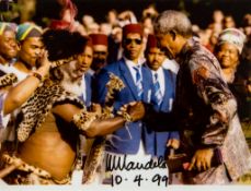 SP A striking 20.5 x 30.5cm colour photograph of Nelson Mandela meeting a... SP A striking 20.5 x