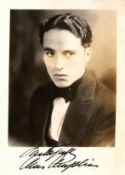 SP A 17.8 x 12.1cm black and white head and shoulders photo of a young... SP A 17.8 x 12.1cm black