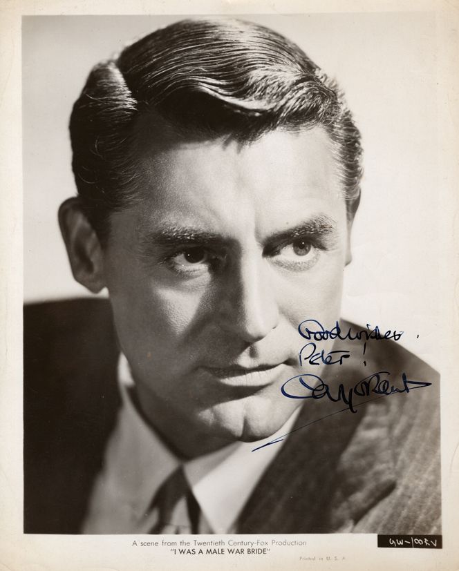 SP An 8 x 10" black and white head and shoulders vintage photograph of Cary... SP An 8 x 10" black