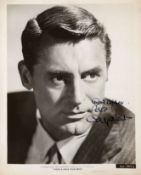 SP An 8 x 10" black and white head and shoulders vintage photograph of Cary... SP An 8 x 10" black