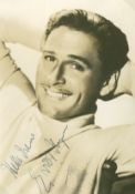 SP A 17.6 x 12.1cm sepia toned head and shoulders photograph of Errol Flynn SP A 17.6 x 12.1cm sepia