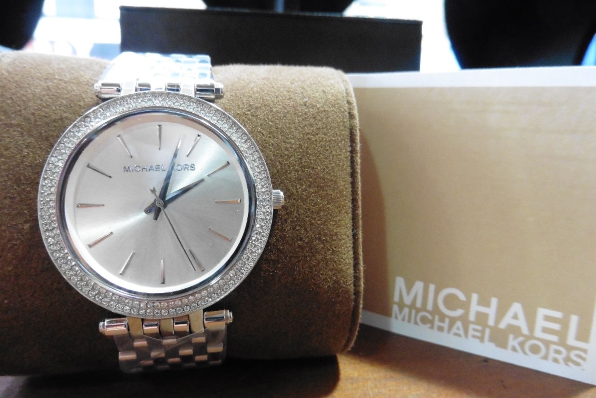 A Ladies Michael Kors watch from the Darci collection, model number MK3190.  Stainless steel , has a
