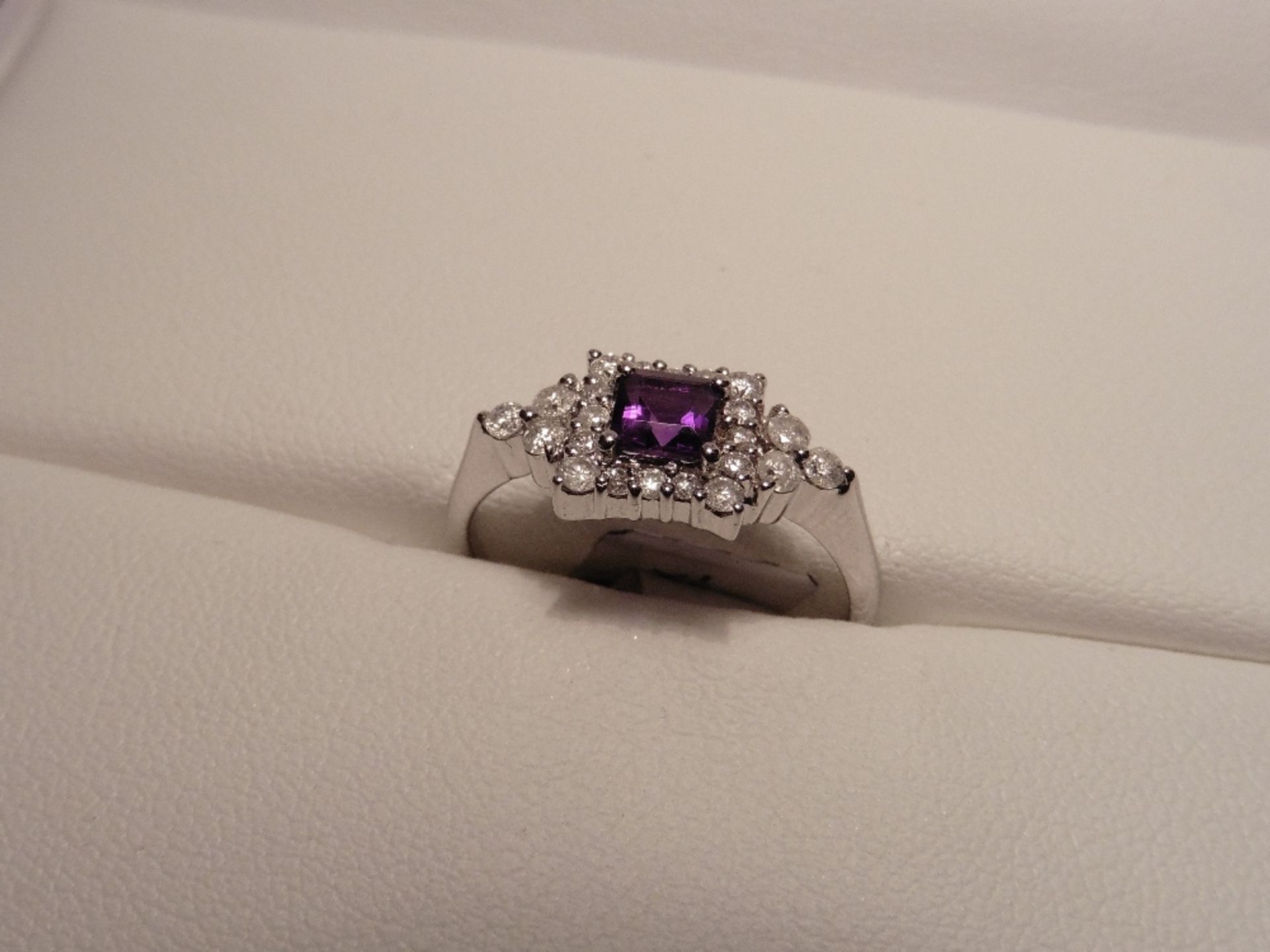 9ct white gold amethyst and diamond dress ring set with a single princess cut amethyst weighing 0.30