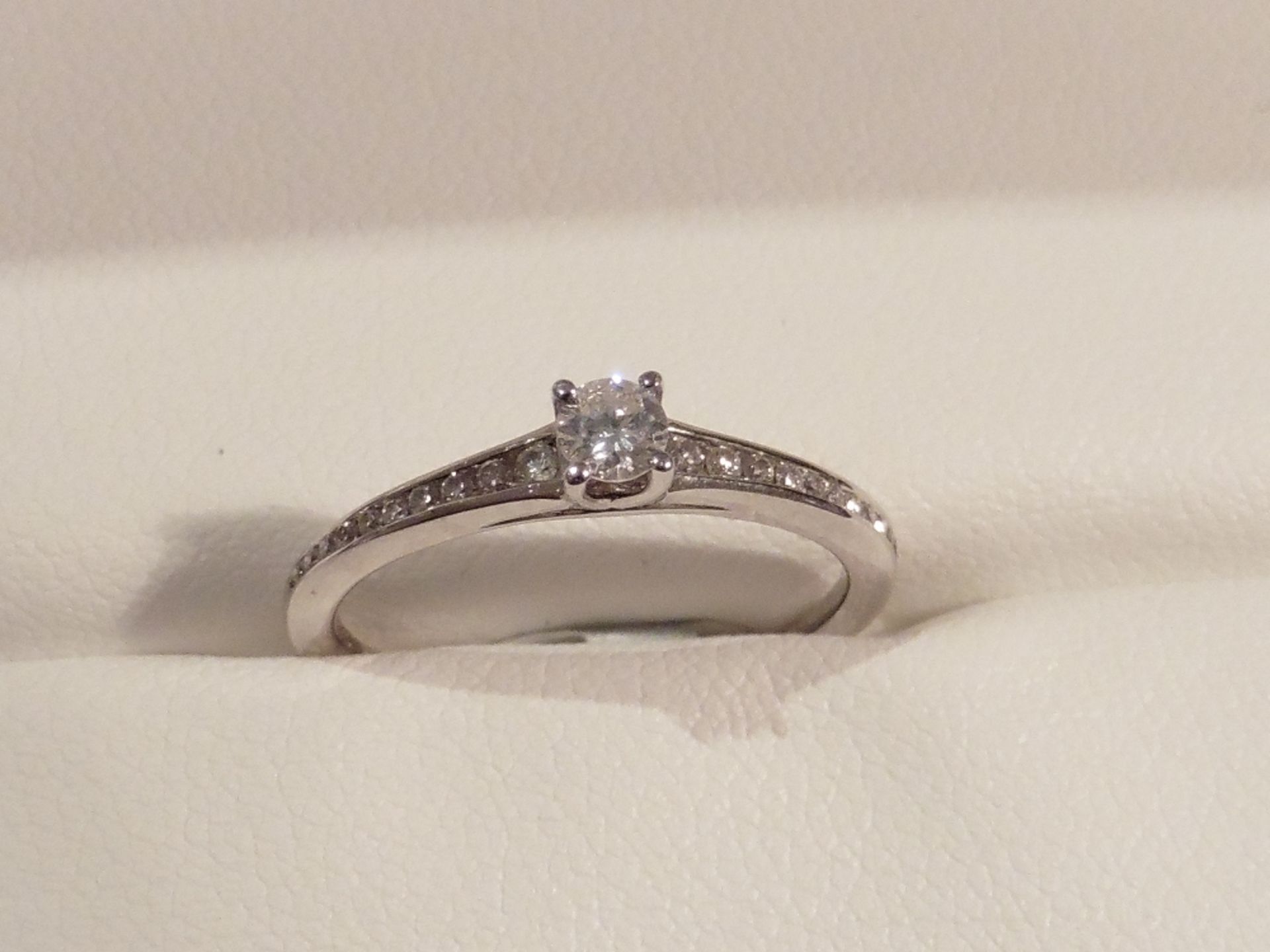 9ct white gold diamond set solitaire ring set with a single brilliant cut diamond weighing 0.15ct se