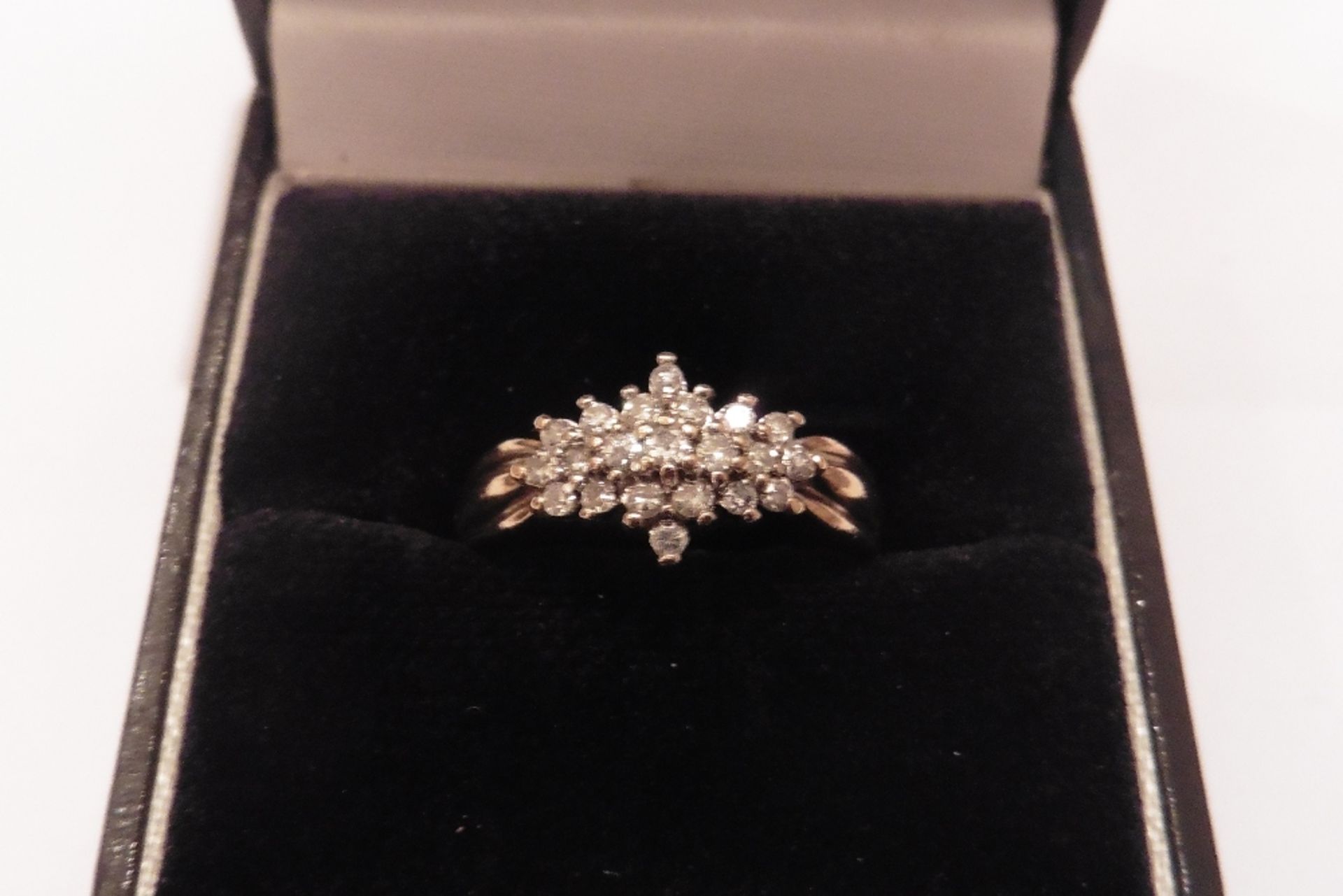 Pre-owned 9ct yellow gold diamond aeroplane style cluster ring set with small brilliant cut diamonds