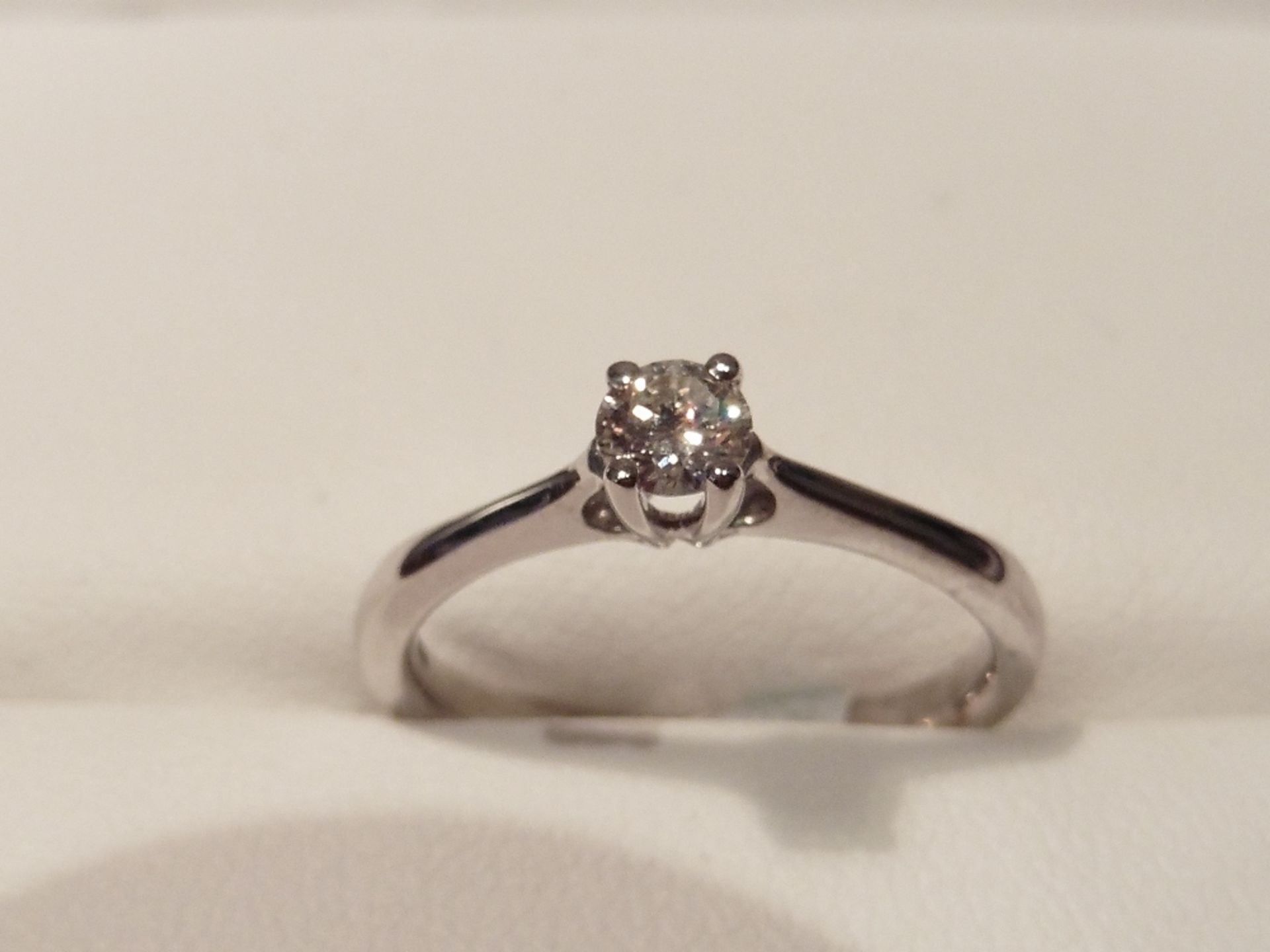 18ct white gold diamond solitaire ring set with a single brilliant cut diamond weighing 0.40ct of F