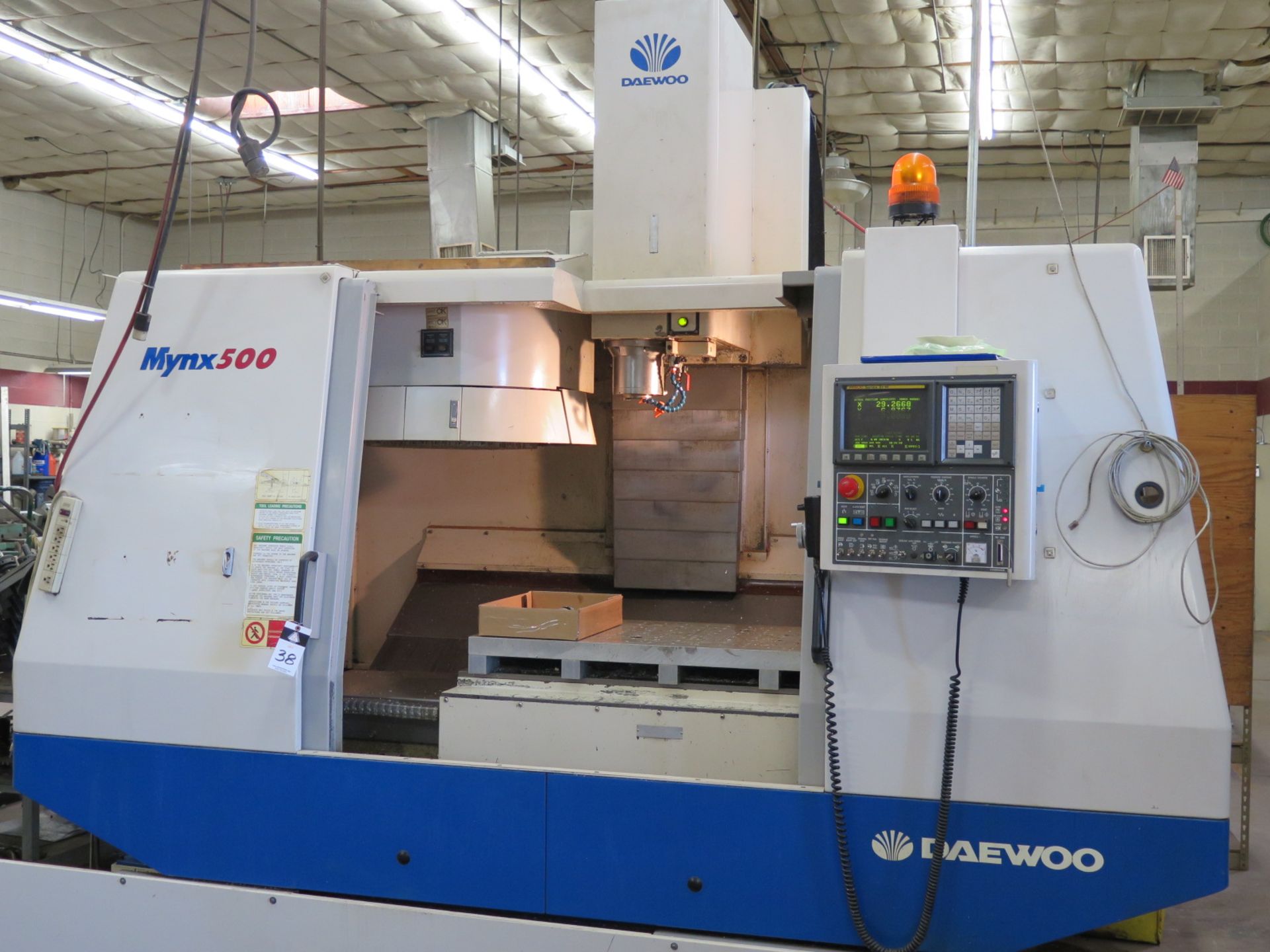 Daewoo Mynx 500 CNC Vertical Machining Center w/ Fanuc Series 21-M Controls, 24-Station ATC, CAT-