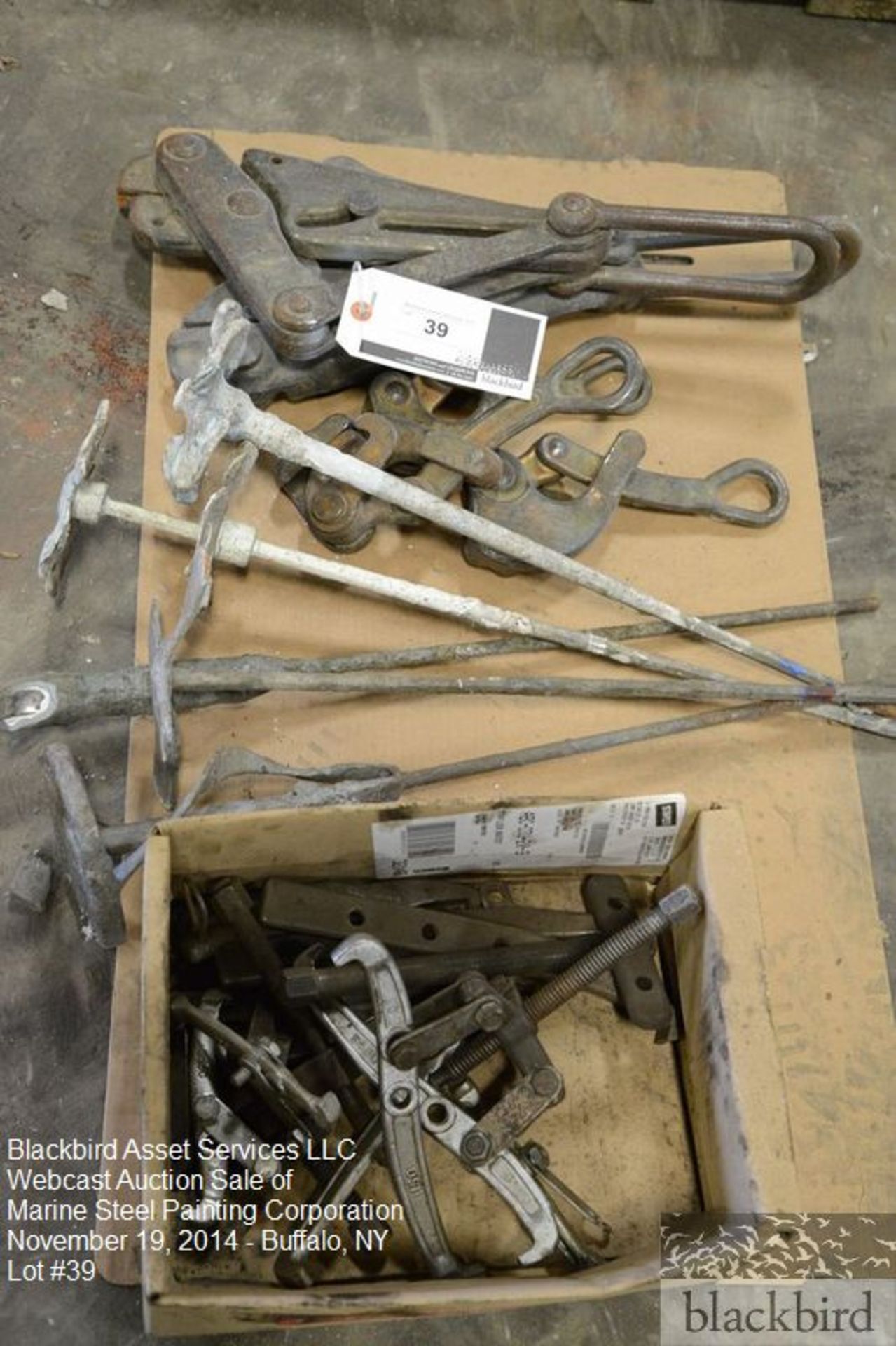 Lot- wheel puller, various size paint mixers, lifting attachments