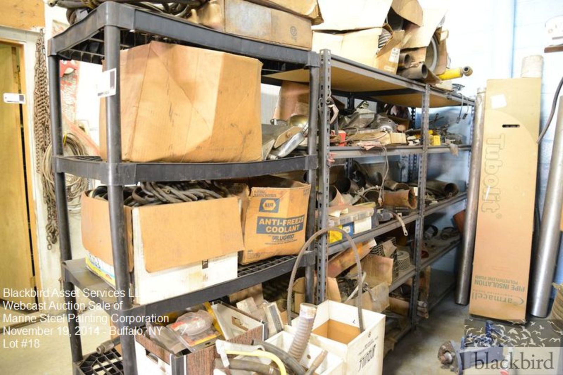 Lot- Shelves and contents of shelving- misc. truck parts, hoses, clamps, …