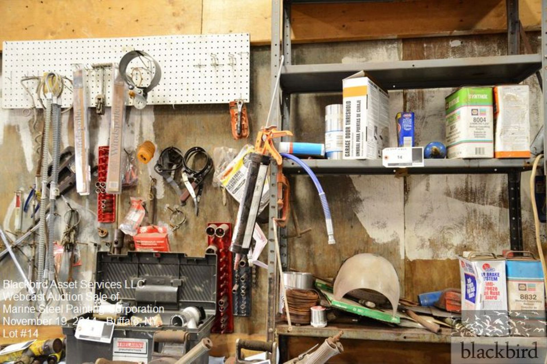 Lot- Contents of wall- mechanic tools, sockets, wrenches,…