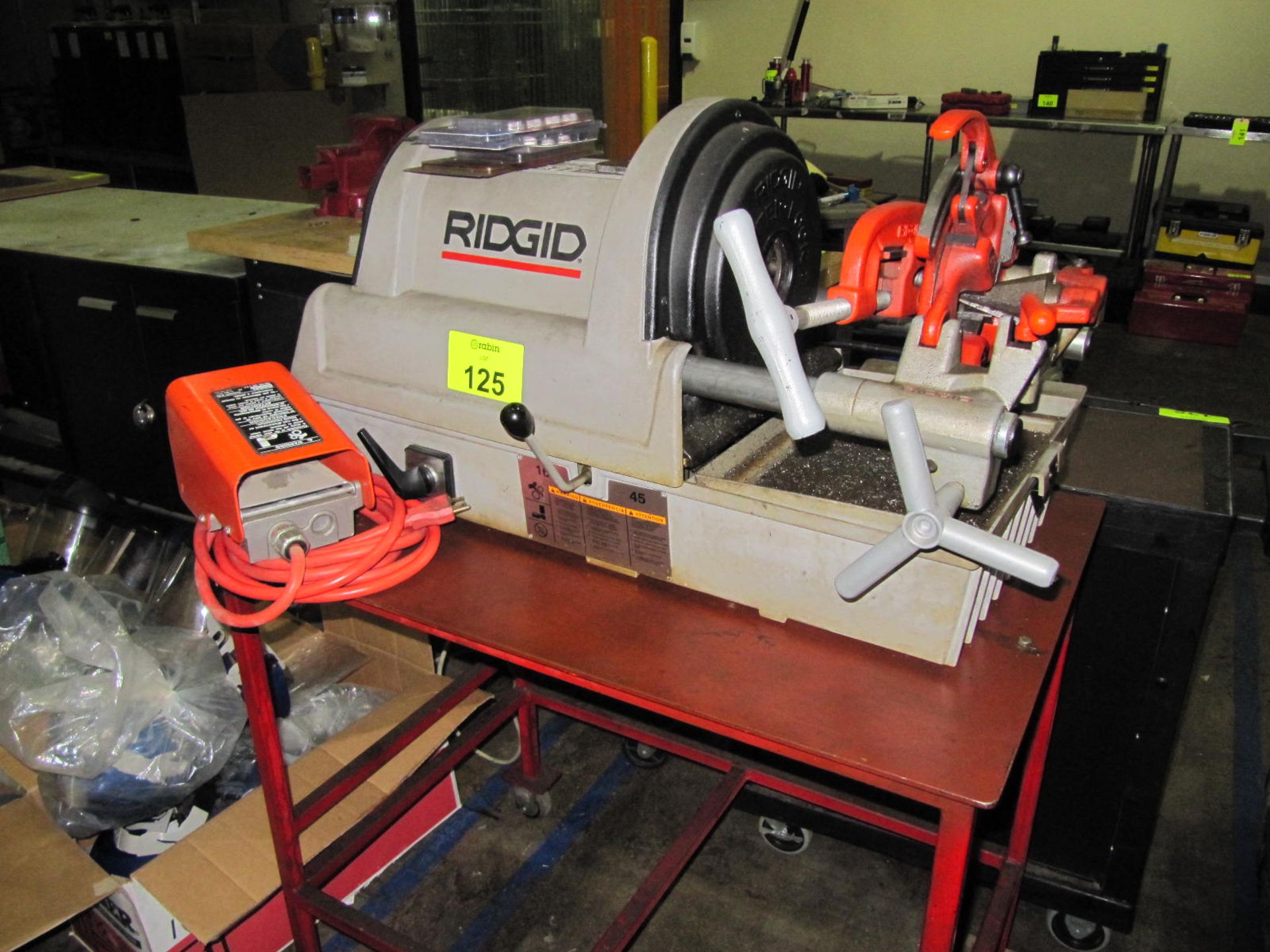 Ridgid pipe threader, model 1822-1, s/n EA23130 0808, on rolling table