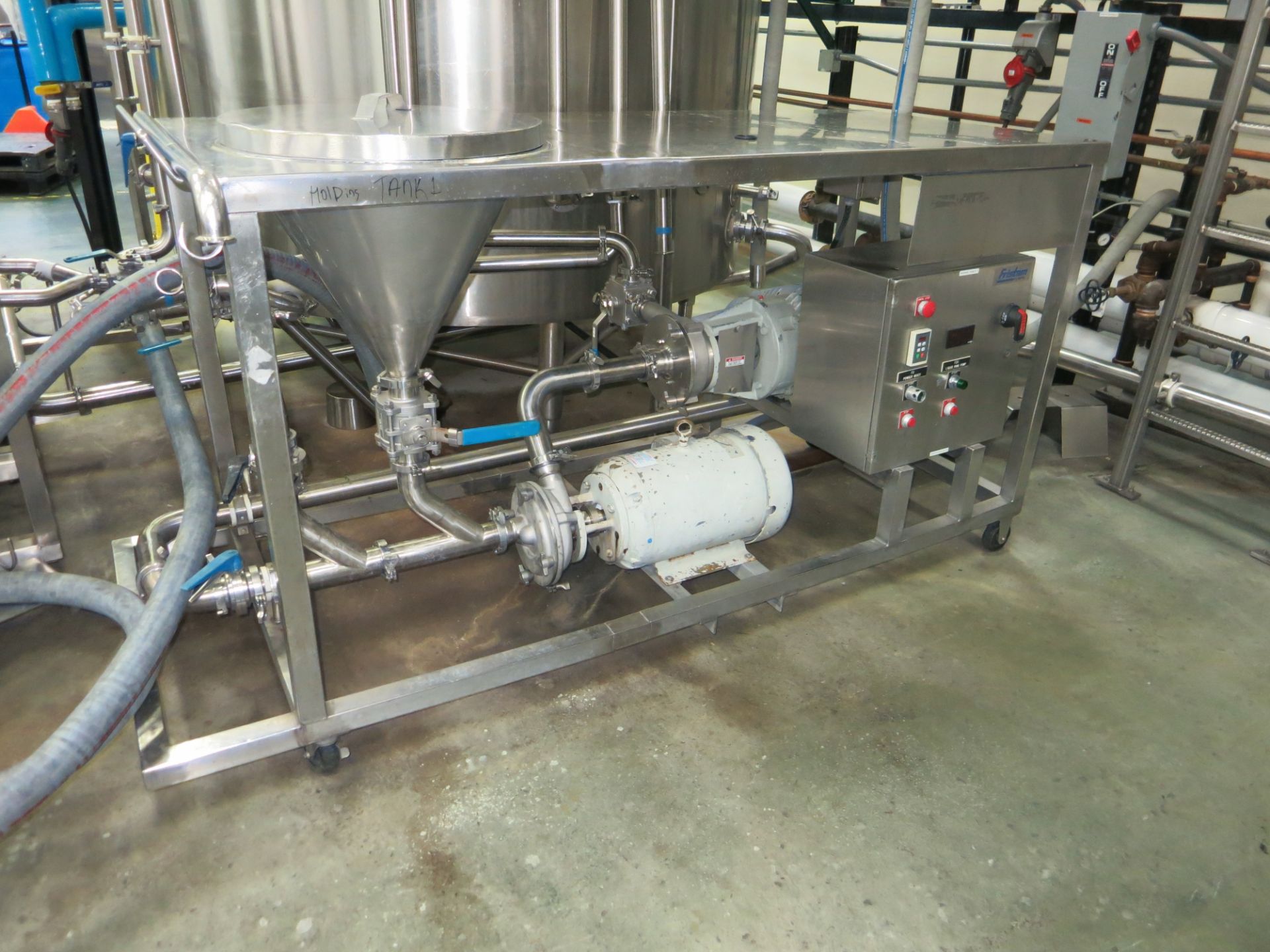 Fristam liquiverter blend station , includes (2) Fristam centrifugal pumps, integrated funnel,