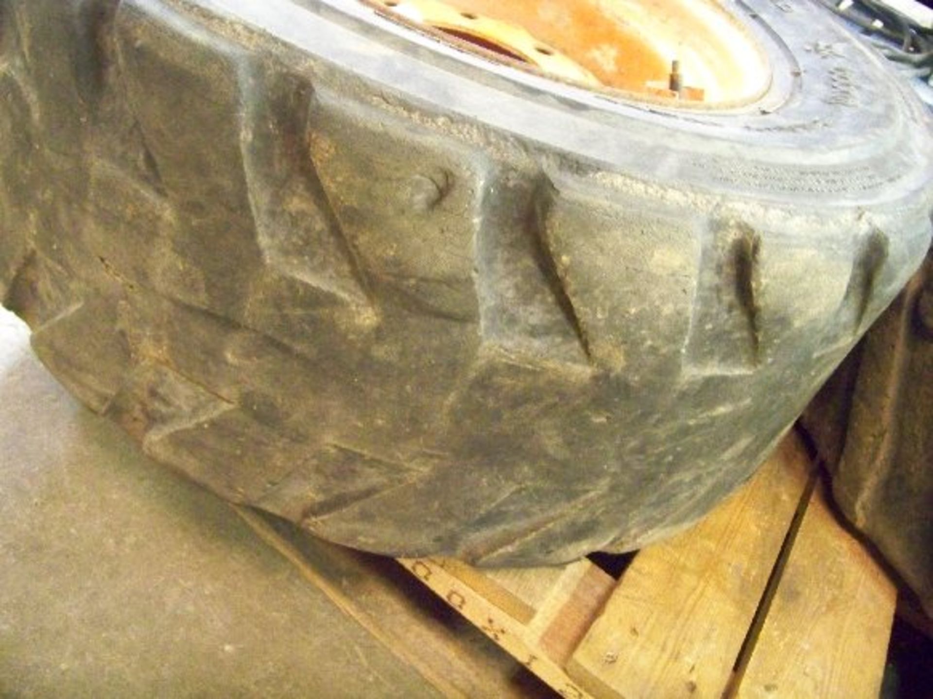 12-16.5 TIRE, 8 LUG - Image 2 of 2