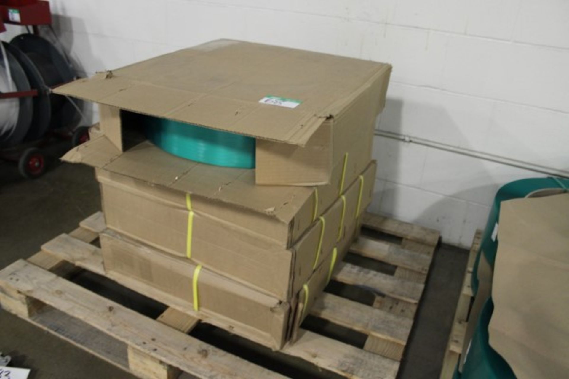 4 BOXES OF GREEN STRAPPING