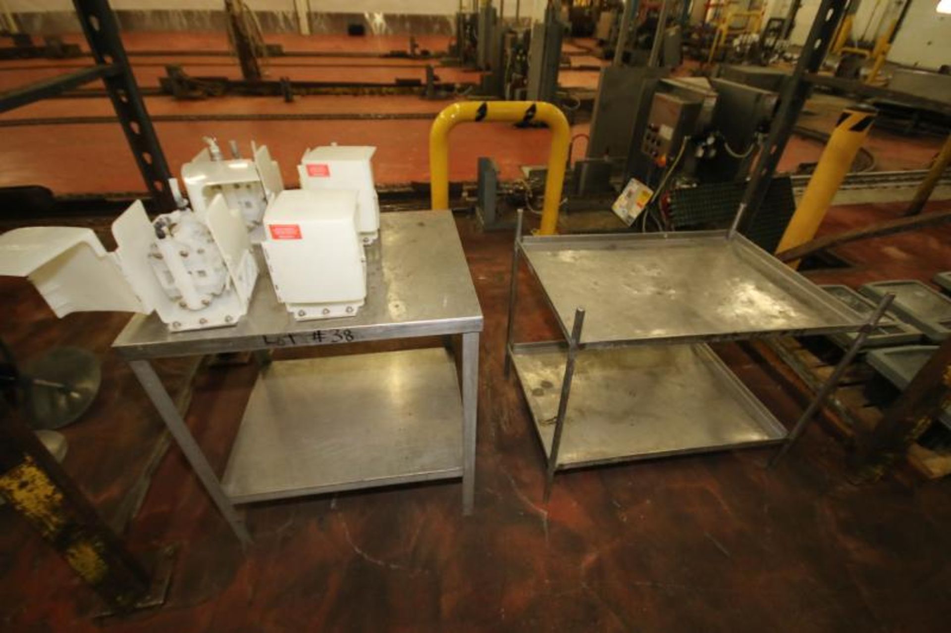 (2) S/S Tables with (4) Ecolab Chemical Feed Pumps