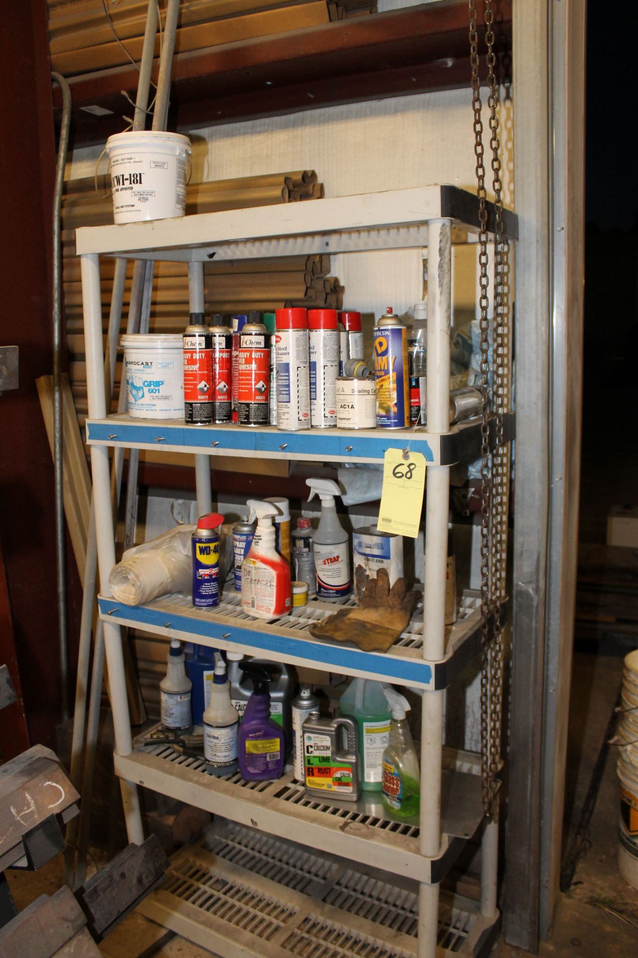 LOT OF CLEANING SUPPLIES, ASSORTED ADHESIVES, PAINT  (Located in shelf unit)  (Location D)