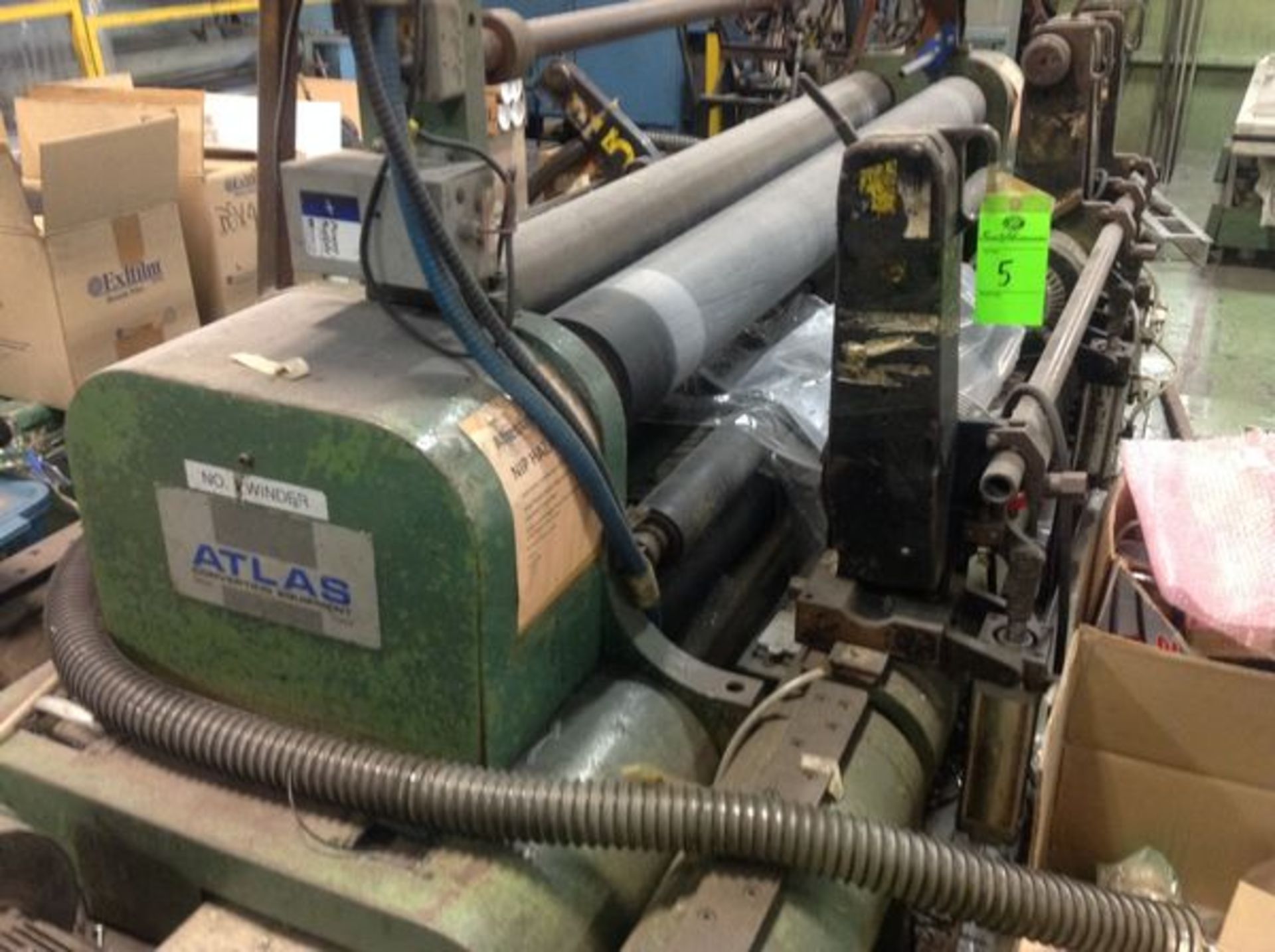 Atlas surface drum winder; line speed 1000ft/min, 2 winding rolls comes with extra winder arms, this