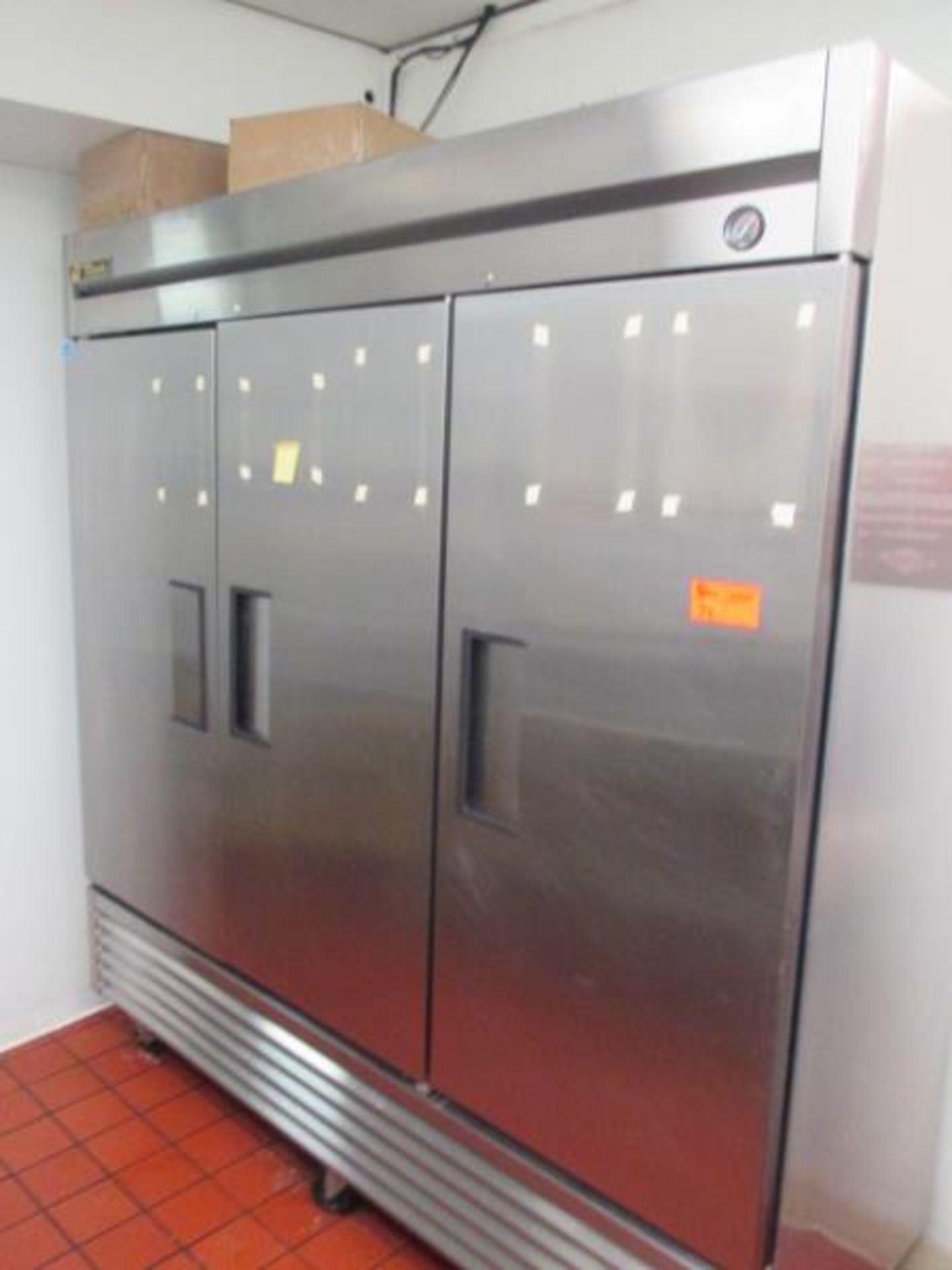 Three Door Reach In Refrigerator by True, Model: T-72, SN: 7266711