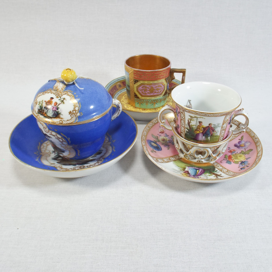 Collection of 3 19th century continental porcelain cups and saucers including 2 chocolate cups,