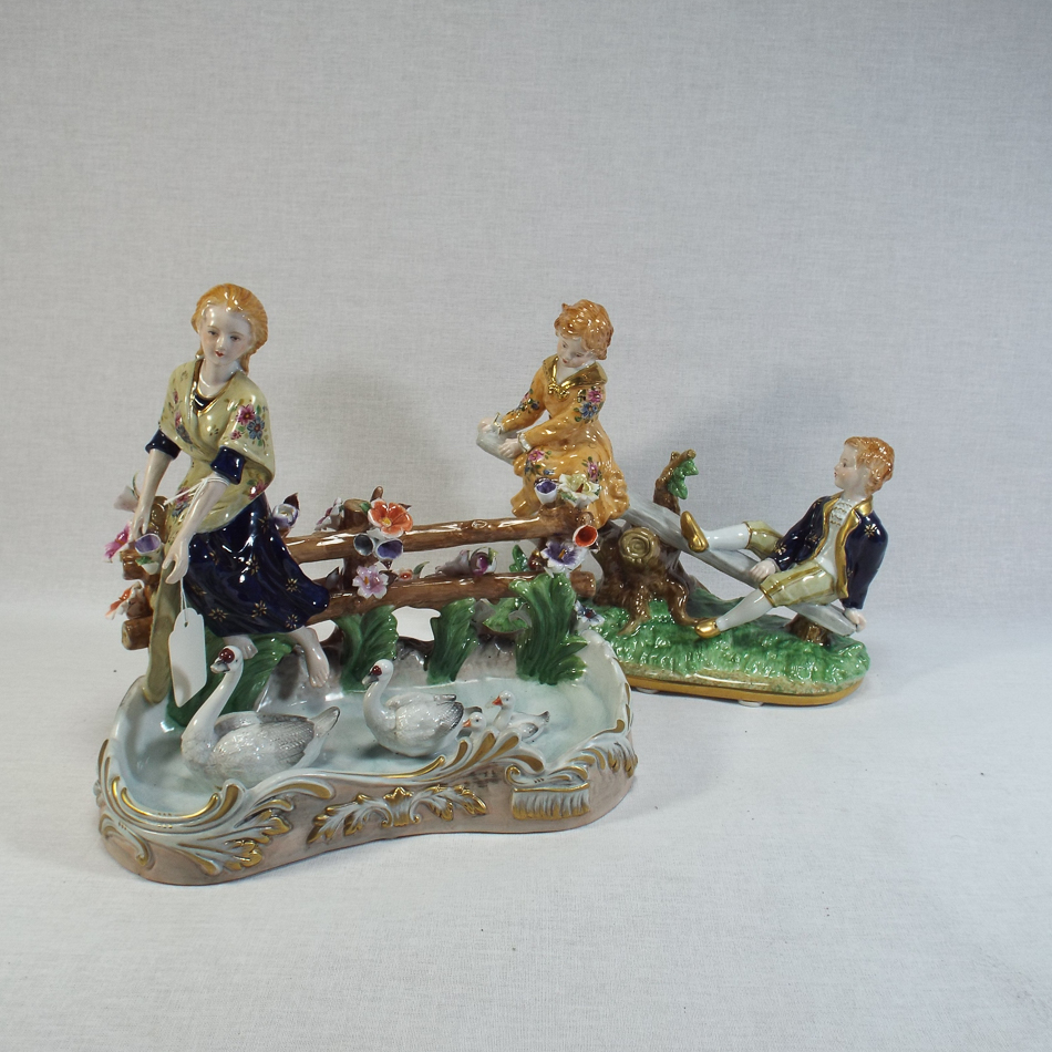 2 Meissen porcelain figure groups, one depicting children on a see saw, 21 cm x 24 cm, the other