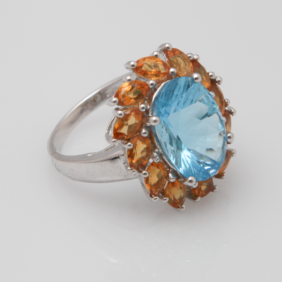 9 carat white gold blue topaz and citrine cocktail ring