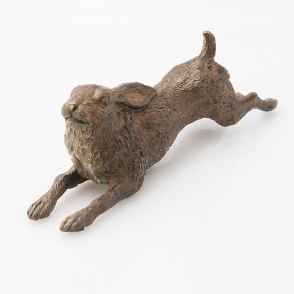 Cold painted bronze model of a running hare, 11.5 cm long