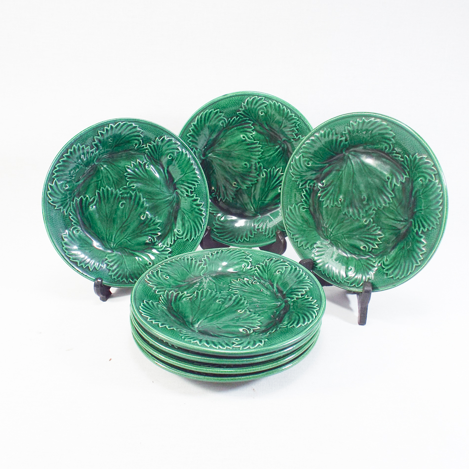 Set of seven 19th century green glazed plates moulded leaf design, 20.5 cm in diameter