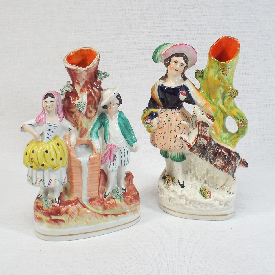 2 Victorian Staffordshire flat back figures, one depicting a country girl with a goat 20.5 cm