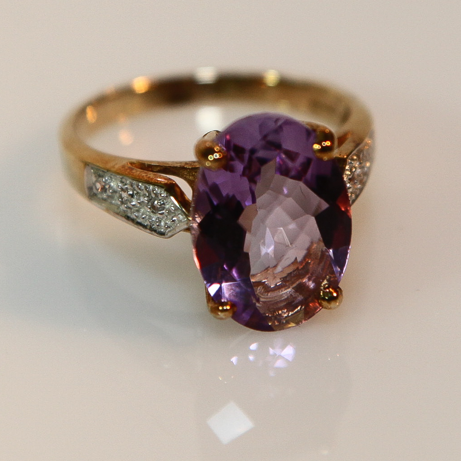 9ct gold mixed cut amethyst and diamond set dress ring - size N