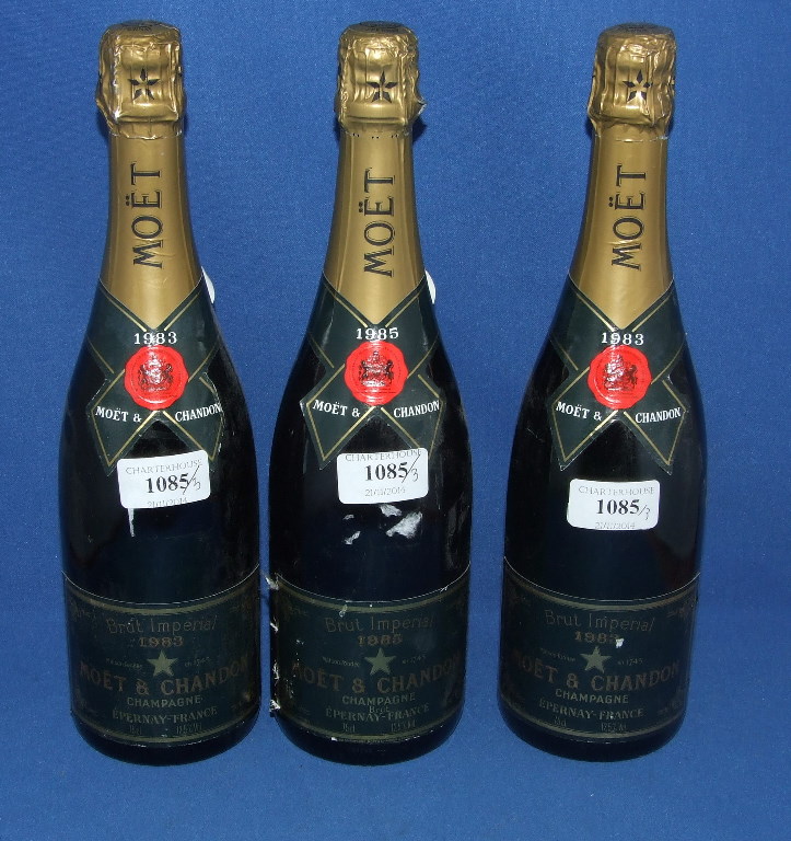 Two bottles of Moet & Chandon champagne, 1983, and another, 1985 (3)