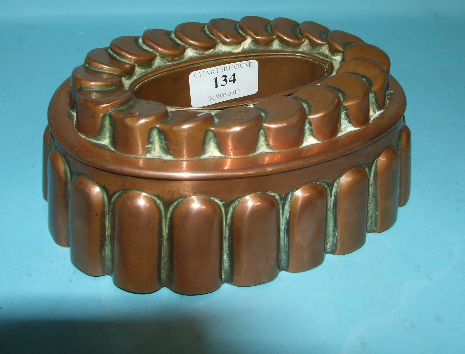 A copper jelly mould, 19.5 cm wide