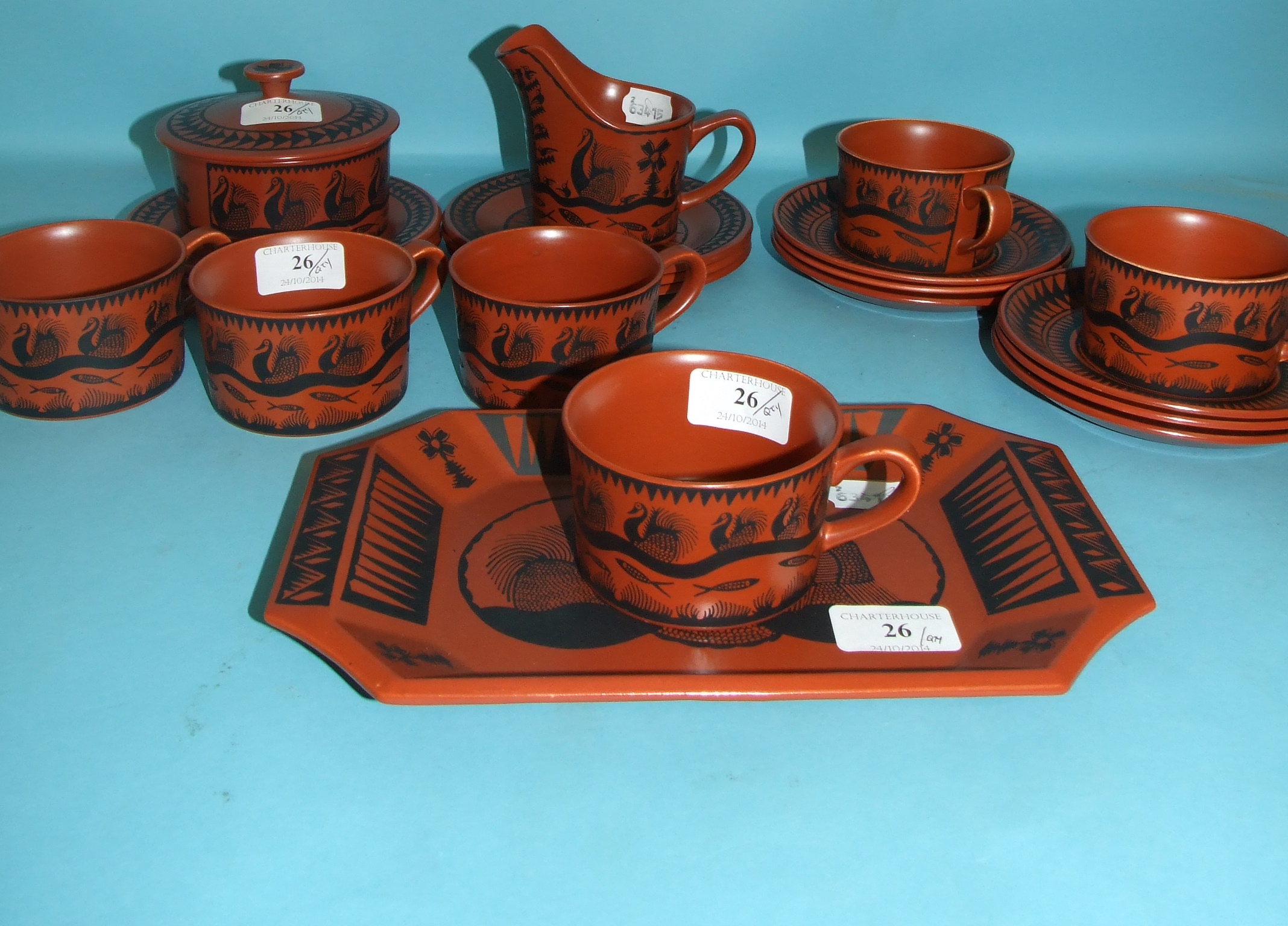 A Royal Worcester Scottie Wilson part tea service, comprising six cups and saucers, six tea