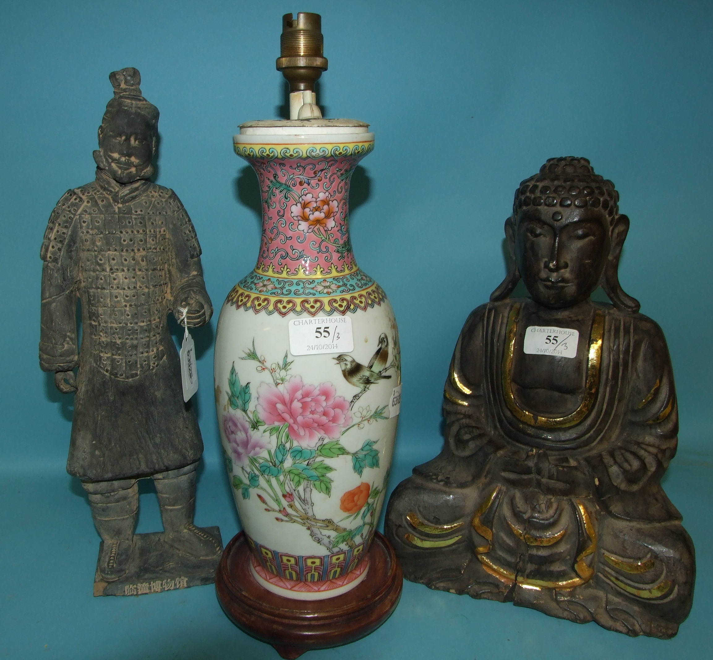 A Chinese lamp, a carved wood Buddha, 31 cm high, and a museum copy of a Chinese warrior (3)