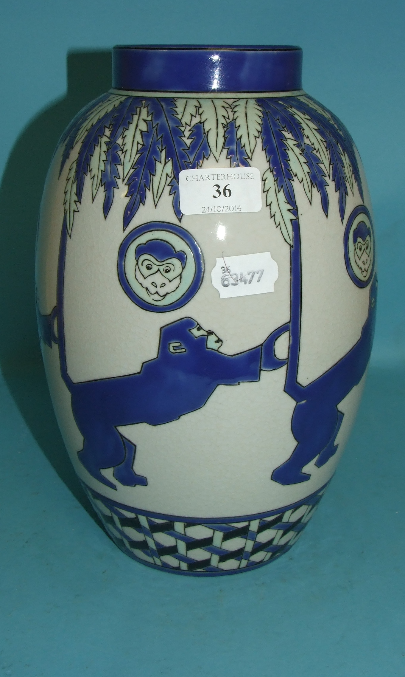 A pottery vase, decorated monkeys, 29 cm high   Condition report  Report by NG

Modern item.  It